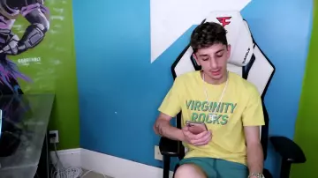 Virginity rocks tee worn by FaZe Rug in Reacting to TikToks About Me! (HE LEAKED MY ADDRESS)