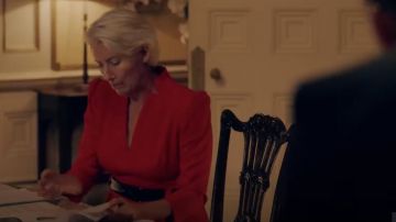 The red dress V-neck shoulders marked range by Vivienne Rook (Emma Thompson) in Years and Years (Season 1)