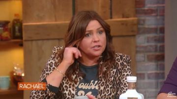 The kooples Leop­ard Print Blaz­er worn by Rachael Ray on The Rachael Ray Show March 2, 2020
