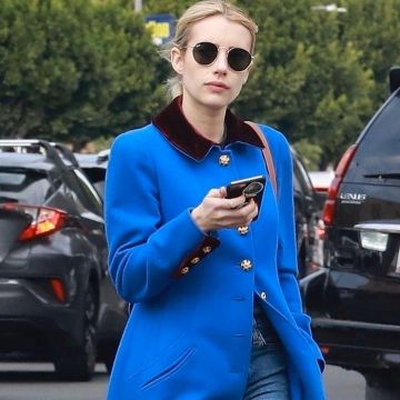 Celine Tri­om­phe Can­vas Small Draw­string Bag worn by Emma Roberts Los Angeles March 1, 2020