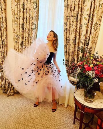 Carolina Herrera Em­broi­dered Tulle Busti­er Dress worn by Dianna Agron Roger Vivier Press Day in Paris February 27, 2020