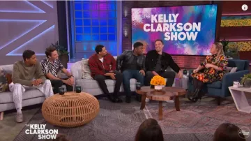 Carolina herrera Flo­ral Over­sized Mi­ni Shirt­dress w/ Gath­ered worn by Kelly Clarkson on The Kelly Clarkson Show March 4, 2020
