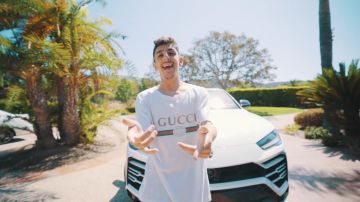 Gucci Vintage-logo cotton-jersey T-shirt worn by FaZe Rug in I Bought my Dad a BRAND NEW LAMBORGHINI **super emotional**