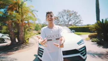 Gucci Vintage-logo cotton-jersey T-shirt worn by FaZe Rug in I Bought my Dad a BRAND NEW LAMBORGHINI **super emotional**
