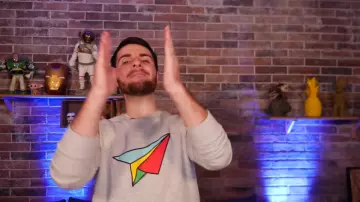 The gray sweater with a plane of colored Amixem in his YouTube video and GUESS THE CORRECT CARTOON CHARACTER ! #1