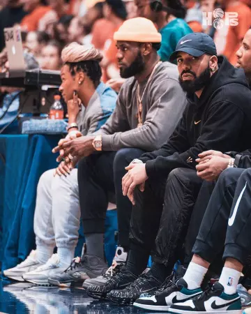 Nike Sneakers worn by Drake as seen at Bronny’s game