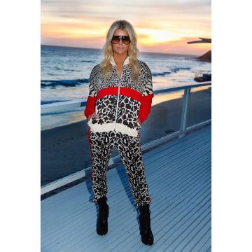Stella McCartney In­tar­sia Knit­ted Track Jack­et worn by Jessica Simpson Instagram March 6, 2020