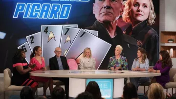 Hunter bell Leop­ard Casper Dress worn by Brigitte Nielsen on The Talk March 9, 2020