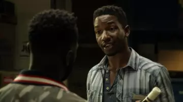 Striped shirt worn by Elijah (Mamoudou Athie) as seen in Uncorked