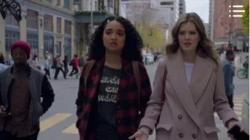 Acid Black Graph­ic Tee worn by Kat Edison (Aisha Dee) in The Bold Type Season 4 Episode 8