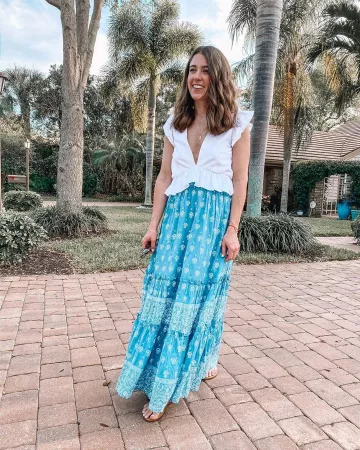 Sandalias tory burch de Liz Adams en la cuenta de Instagram @lizadams