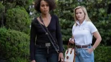 White Po­lo worn by Elena Richardson (Reese Witherspoon) in Little Fires Everywhere Season 1 Episode 1
