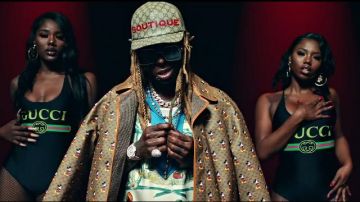 Gucci x Dis­ney Mick­ey GG Print Re­versible Coat worn by Lil Wayne in the music video Lil Wayne - Mama Mia (Official Video)