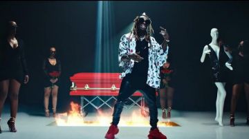 Balenciaga Triple S Clear Sole Sneak­er Red for Men worn by Lil Wayne in the music video Lil Wayne - Mama Mia (Official Video)