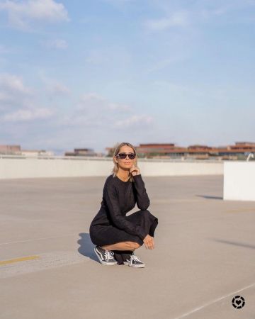 Vans Black Sneak­ers of Candice Mathis on the Instagram account @collectivelycandice