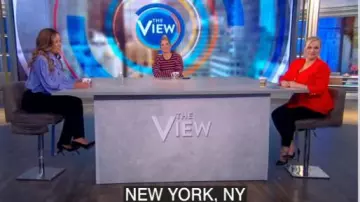 St. John Sculp­tur­al Mi­lano Knit V-Neck Pe­plum Jack­et worn by Meghan McCain on The View March 20, 2020