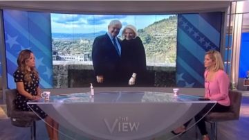 Victoria beckham Flower Print Pen­cil Dress worn by Sunny Hostin on The View March 26, 2020