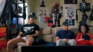 The black t-shirt Love (like Hate) worn by Franky (Franck Gastambide) in the movie Pattaya