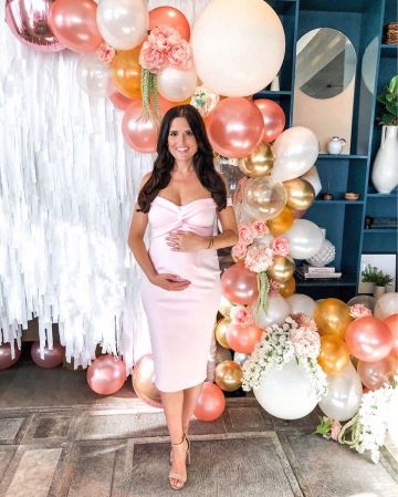 Knot Midi Dress de Michelle Zuzek en la cuenta de Instagram @stylebeacon