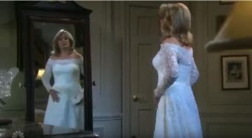 David's bridal Off-The-Shoul­der Plus Size A-Line Wed­ding Dress worn by Dr. Marlena Evans Black (Deidre Hall) in Days of Our Lives March 27, 2020