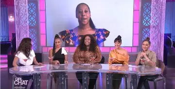 Maje Capricorn-embellished cotton-jersey T-shirt worn by Jeannie Mai on The Real March 29, 2020