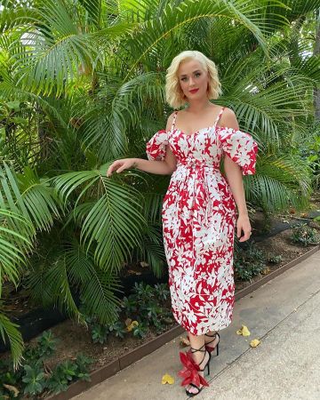 Rosie Assoulin Pleated Cold Shoulder Floral Print Silk Taffeta Midi Dress of Katy Perry on the Instagram account @katyperry March 30, 2020
