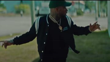 The green jacket Louis Vuitton worn by Tory Lanez in her video clip Who  Needs Love