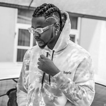 Palm Angels multicolored hoodie worn by Kizz Daniel on his Instagram account @iamkizzdaniel