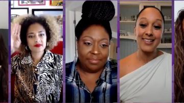 Vestido de camisa midi licoroso en estampado de tigre mixto usado por Amanda Seales en The Real 15 de abril de 2020