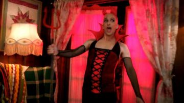 Red devil corset dress of Dean Pelton (Jim Rash) in Community (S02E05)