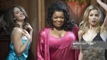 Hot pink satin and lace robe worn by Shirley Bennett (Yvette Nicole Brown) in Community (S02E05)