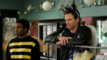 Black and white fur cat ears worn by Jeff Winger (Joel McHale) in Community (S02E12)