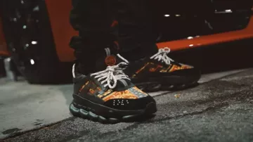 Versace Chain Re­ac­tion Baroque Print Sneak­ers worn by Moneybagg Yo in Traffic Official Music Video by Fredo Bang 