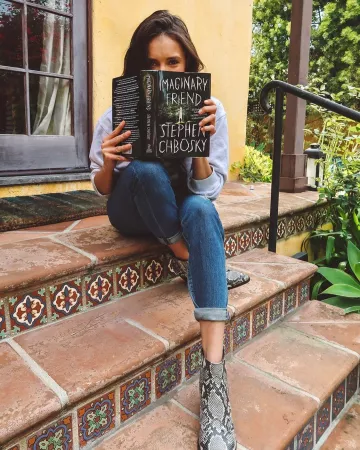 Re Done Ul­tra High Rise An­kle Crop worn by Nina Dobrev Instagram Post April 6, 2020