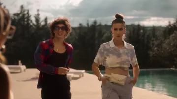 The polo crop top Lacoste of Rebeca (Claudia Salas) in Elite (S03E02)