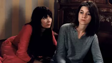The gray sweater worn by Milla Robin (Charlotte Gainsbourg) in The log