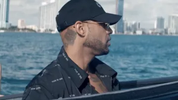 La veste noire zippée Fear of God de Booba dans le clip Blanche de Maes
