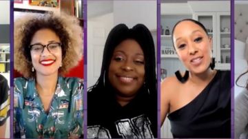 Alix nyc Dako­ta One-Shoul­der Puffed-Sleeve Silk Body­suit worn by Tamera Mowry on The Real April 19, 2020