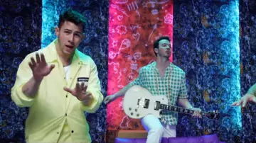 Maison Margiela 10 Stereotype Coach Jacket worn by Nick Jonas in Runaway music video by Sebastián Yatra, Daddy Yankee, Natti Natasha feat. Jonas Brothers
