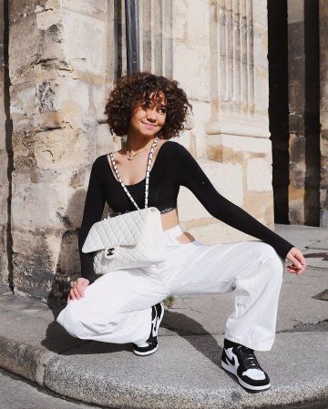 El par de Nike Jordan 1 Retro High Twist (W) que lleva Léna Situations en su cuenta de Instagram @lenamahfouf