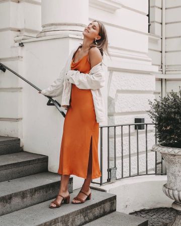 Strap­py Dress Or­ange of Kira on the Instagram account @shoppisticated