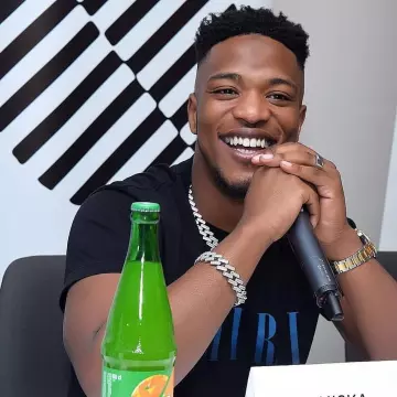 Le t-shirt Amiri à logo imprimé porté par Niska sur son compte Instagram @niska_officiel