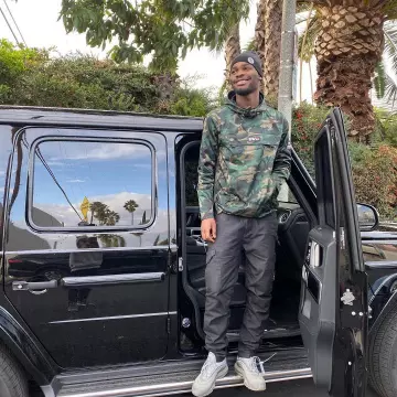 La veste Ovo camouflage portée par David Omoregie sur son compte Instagram @santandave 