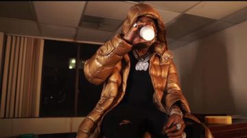 Moncler Long Puffer Coat worn by YFN Lucci in his Covid 19 (Official Music Video)