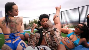 Burberry Vin­tage Check Puffer Jack­et worn by Blueface in his Vibes (Official Music Video)
