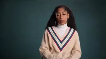 Beige V Neck Sweater worn by Drea Barris (Iman Benson) in #blackAF Season 1 Episode 7