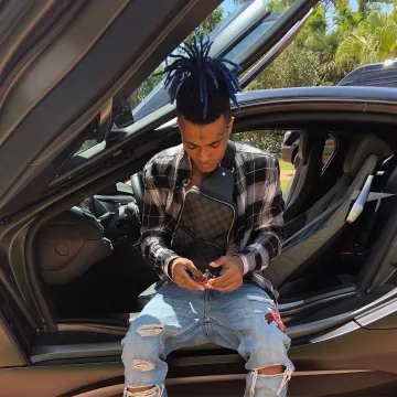 Checked shirt worn by XXXTentacion on the Instagram account @badvibesforeverofficial