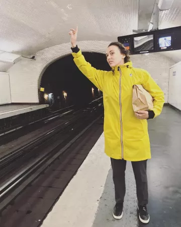 K. Way waterproof long hooded yellow worn by Audrey Pirault on his account Instagram @audrey.pirault