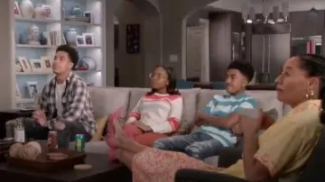 Striped Po­lo worn by Jack Johnson (Miles Brown) in black-ish Season 6 Episode 22