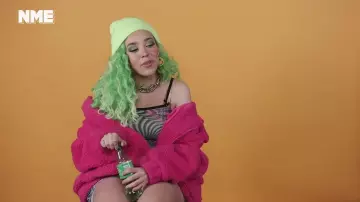 Pink oversized fleece jacket worn by Doja Cat in Doja Cat | Show & Tell YouTube video by NME